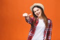 People, gesture, style and fashion concept - happy young woman or teen girl in casual clothes showing thumbs up, isolated over Royalty Free Stock Photo