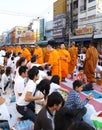 People give food offerings to 12,357 Buddhist monks Royalty Free Stock Photo