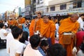 People give food offerings to 12,357 Buddhist monks Royalty Free Stock Photo