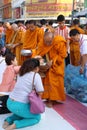 People give food offerings to monks Royalty Free Stock Photo