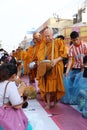 People give food offerings to monks Royalty Free Stock Photo