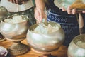 people give rice in alms bowl of buddhist monk, food offering for a monk Royalty Free Stock Photo