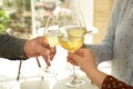 People with glasses of wine on blurred background Royalty Free Stock Photo