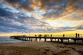 People on Glenelg Beach jetty