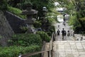 People go back home after worshiping at a Japanese temple