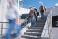 People go down on concrete ladder Royalty Free Stock Photo