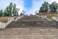 People go down the stairs on Flotsky Boulevard in Mykolaiv, Ukraine