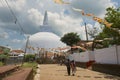People go to the Ruwanwelisaya stupa in Anuradhapura, Sri Lanka.