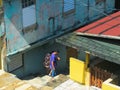 People going down the stairs in San Juan`s Ghetto Royalty Free Stock Photo