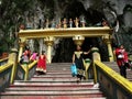 People going down and up the stairs of the Batu Caves. Malaysia Royalty Free Stock Photo