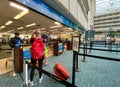 People going through Orlando International Airport MCO TSA security in masks on a slow day due to the coronavirus