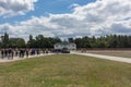 People going to the main entrance of the Sachsenhausen Concentration Camp Memorial and Museum, Oranienburg, Germany. Royalty Free Stock Photo