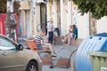 People going to work by bike. Street, road, cars