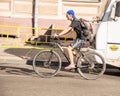 People going to work by bike. Street, road, cars