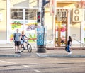 People going to work by bike. Street, road, cars