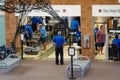 People going through TSA security at a small regional airport