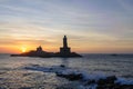 People greet the sunrise in Kanyakumari