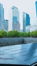 People at Ground Zero Memorial Manhattan for September 11 Terrorist Attack with Engraved Names of Victims. Patriot Day - New York