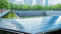 People at Ground Zero Memorial Manhattan for September 11 Terrorist Attack with Engraved Names of Victims. Patriot Day - New York