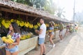 People Group Buying Bananas And Pineapples On Street Traditional Market, Young Man And Woman Travelers Royalty Free Stock Photo