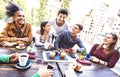 People group drinking cappuccino at coffee bar restaurant - Friends talking and having fun together at outdoors cafeteria Royalty Free Stock Photo