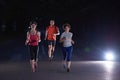 People group jogging at night Royalty Free Stock Photo