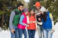 People Group Using Smart Phone Snow Forest Happy Smiling Young Friends Walking Outdoor Winter