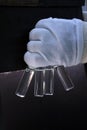 People hand holding a test tube vial sets for analysis in the gas liquid chromatograph. Laboratory assistant inserting laboratory Royalty Free Stock Photo