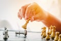 People hand playing Chess board game checkmate winner in business concept Royalty Free Stock Photo