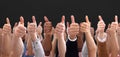 People Hand Showing Thumb Up Sign Against Black Backdrop Royalty Free Stock Photo