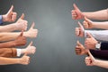 People Hand Showing Thumb Up Sign Against Green Backdrop Royalty Free Stock Photo
