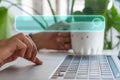 People hand using laptop or computor searching for information in internet online society web with search box icon Royalty Free Stock Photo