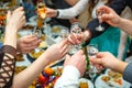 People hands Clinking glasses with vodka and wine Royalty Free Stock Photo