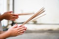 People hands lighting incense stick fire,Pay respect to buddha statue Royalty Free Stock Photo