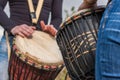 People hands playing music at djembe drums Royalty Free Stock Photo