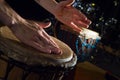 People hands playing music at djembe drums Royalty Free Stock Photo