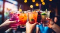 People hands toasting multicolored fancy drinks - Young