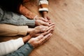 People, hands together and generations in care above on mockup for unity, compassion or trust on wooden table. Group