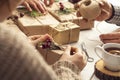 People hands wrap gift boxes