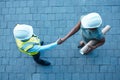 People handshake on site, architect partnership with engineer in construction and welcome b2b in Atlanta. Industrial Royalty Free Stock Photo