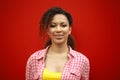 People and happiness concept. Cheerful African American young woman smiling at camera showing her ultrawhite teeth with Royalty Free Stock Photo