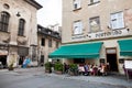 People have dinner in outdoor terrace of italian restaurant