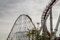 People have fan at the loops of a scaring roller coaster in Japan