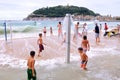 People have fun at the Donostia La Concha beach, at the Basque Royalty Free Stock Photo