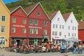 People have lunch at street restaurants at Bruggen in Bergen, Norway Royalty Free Stock Photo