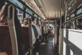 People have a ride in public transport. Sunny day in Hong Kong