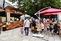 People have a snack at the Street Food Festival in central park Cluj. Royalty Free Stock Photo