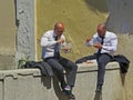 People having Lunch Break. Two men eating.