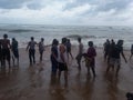 People having fun on the beach,  at Puri beach at Orissa, India Royalty Free Stock Photo