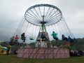 People having fun in a chains carousel